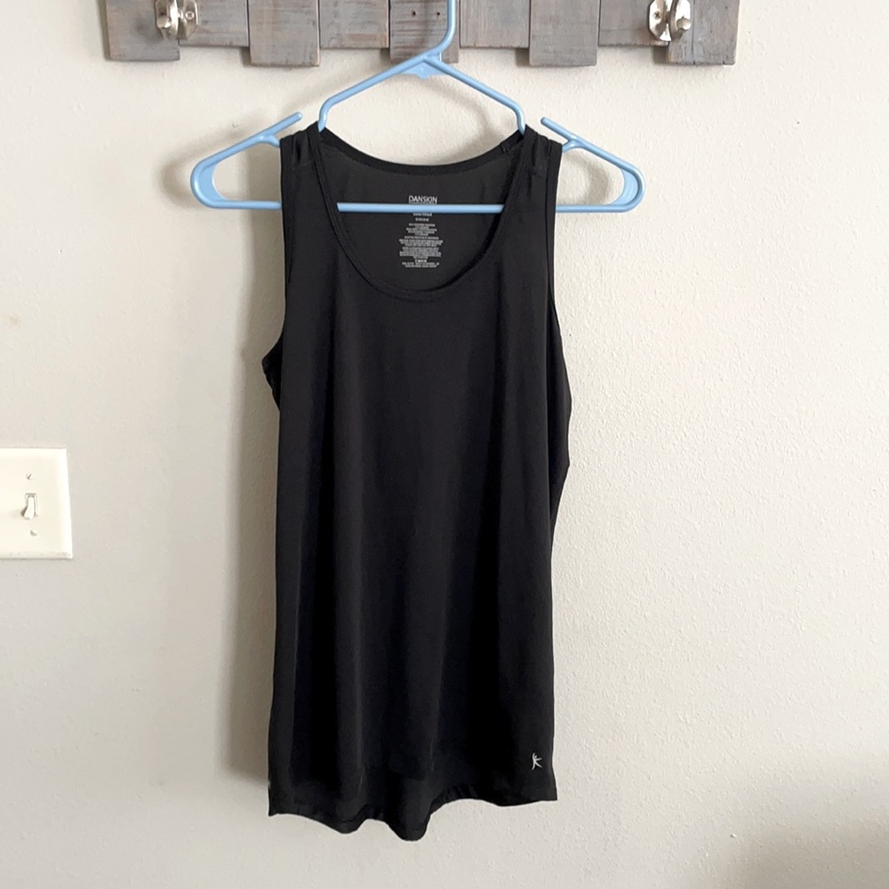 Semi fitted athletic top with breathable back!